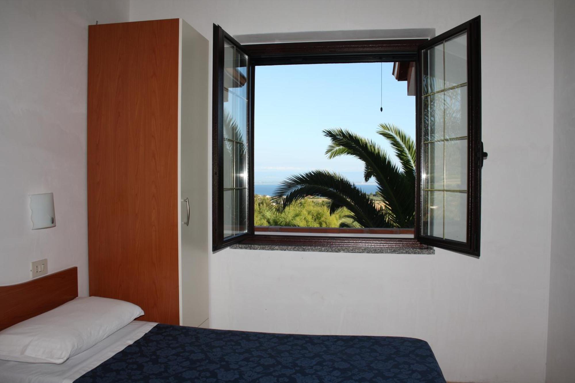 Residence Hotel La Taverna Капо-Ватикано Номер фото